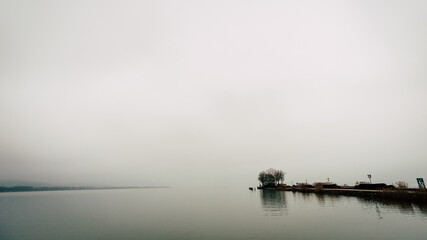Fototapeta premium Fog above the lake of Balaton, Hungary