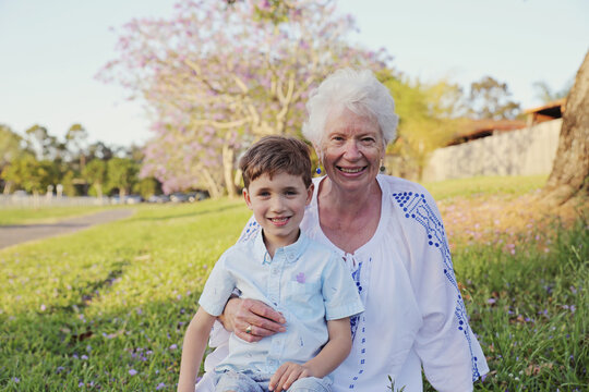 Grandson with grandmother in the park