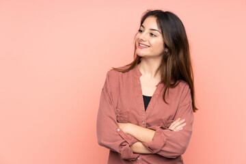 Young caucasian woman isolated on pink background happy and smiling