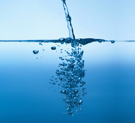 Studio shot of clear blue water