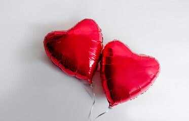 Red balloons in the shape of a heart.