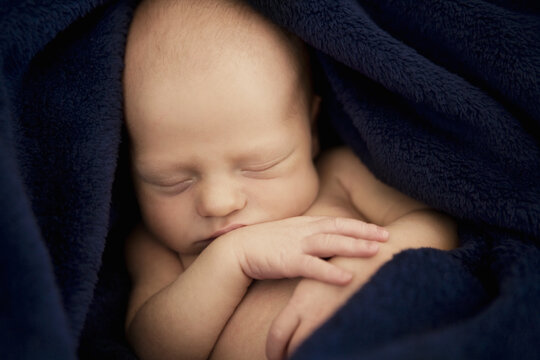 Baby boy (0-1 month) sleeping