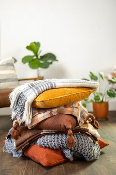 Stack Of Fall Pillows With Blankets