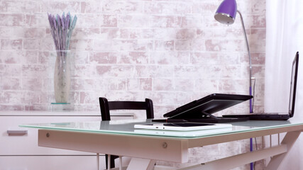 workplace at home, desk with computer and tablet