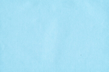 Cardboard blue abstract pattern texture close-up. Retro old paper background. Grunge concrete wall. Vintage blank wallpaper.