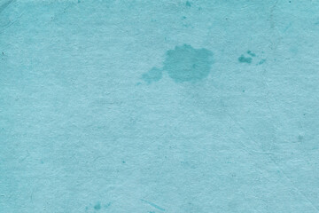 Cardboard blue abstract pattern texture close-up. Retro old paper background. Grunge concrete wall. Vintage blank wallpaper.