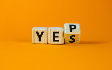 Yes or yep symbol. Turned a cube, changed the word 'yes' to 'yep'. Beautiful orange background. Copy space. Business, motivation and yes or yep concept.