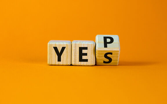 Yes or yep symbol. Turned a cube, changed the word 'yes' to 'yep'. Beautiful orange background. Copy space. Business, motivation and yes or yep concept.