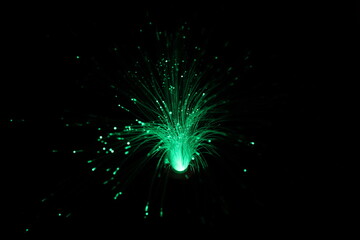 Bokeh of colorful, defocused lights and wires with black background. Fireworks, explosion of colorful lights.