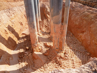 IPOH, MALAYSIA -MARCH 03, 2020:  Bore pile materials made from strong precast concrete designed by the engineers. It will be driven into the soil as the foundation and will be tied by pile caps.
