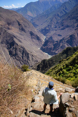 Tourist xxploring the amazing Choquequirao Incan ruins, the 