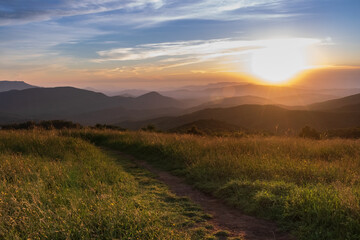 Naklejka na ściany i meble Appalachian Trail at sunset, view from Max Patch bald over the Great Smoky Mountains