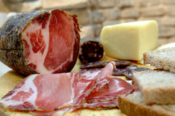 Pork loin typical salami of the Marche region in Italy and pecorino cheese from Sibillini mountains