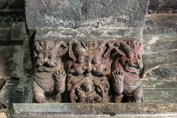 Lakkundi, Karnataka, India - November 6, 2013: Kasivisvesvara Temple. Closeup of  reddish gray...