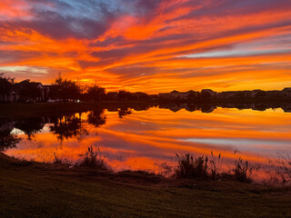 Beautiful pink, orange and blue sunset reflecting on a lake