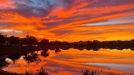Beautiful pink, orange and blue sunset reflecting on a lake