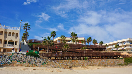 Fototapeta premium Alicante, Spain - January, 2021: Mil Palmeras beach, Pilar de la Horadada town, Mediterranean architecture . High quality photo