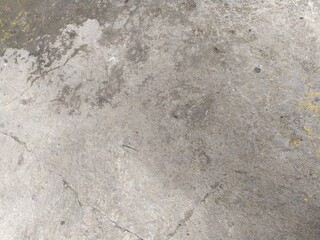 The background of a concrete cast that is exposed to the weather for some time
