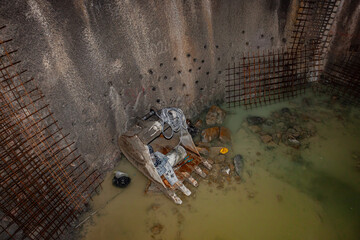 Metro construction in the city. Blasting work in the subway. Descent into the ground.