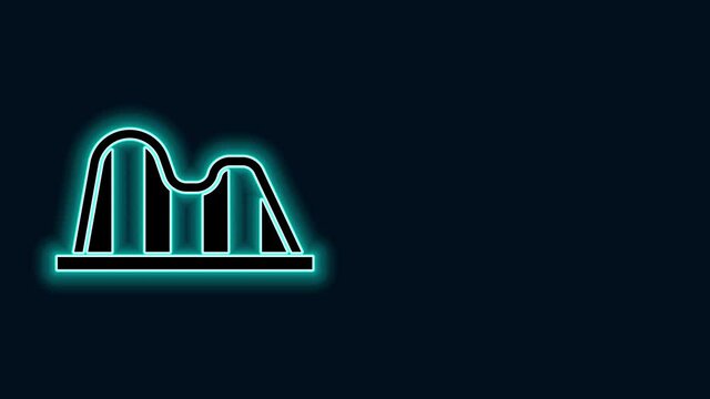 Glowing neon line Roller coaster icon isolated on black background. Amusement park. Childrens entertainment playground, recreation park. 4K Video motion graphic animation