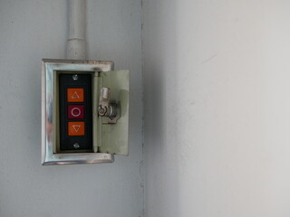 switch of roll up automatic on the wall.