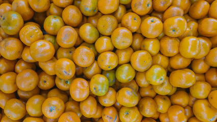 Organic fresh lots of oranges, with a top angle view
