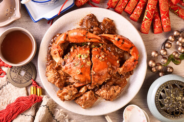 Sauteed crab with rice cake prepared for the lunar new year         