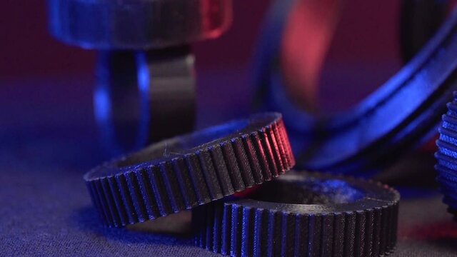 Replacement parts for machine tools in factories, printered on 5D 3D printers. Parts for faFused deposition modeling, 3D printer printing an object from plastic.