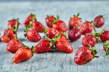 Fresh red strawberries on marble background
