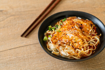 ramen noodles with gyoza or pork dumplings