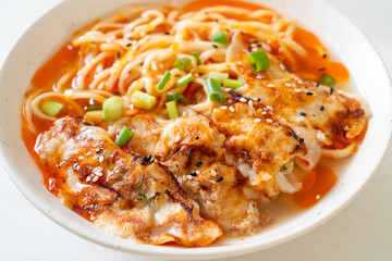 ramen noodles with gyoza or pork dumplings