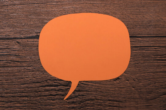 Empty blank color paper speech bubble balloon dialog for your design, flat lay top view