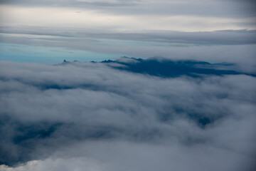 Dawn between fog in mountain ranges of the Colombian Andes