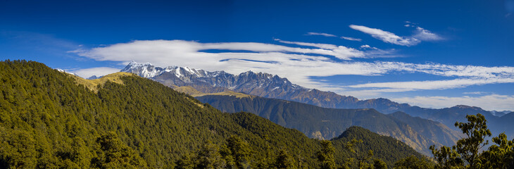 Landscape with snow. Scenic view f Himalayan snow-covered mountain range, on a trek to Bramatal,...