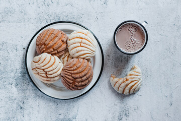 conchas bread and mexican hot chocolate traditional breakfast in Mexico