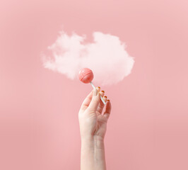 Creative composition lollipop on pastel background 