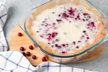 Homemade cranberry and sour cream pie in a glass baking dish