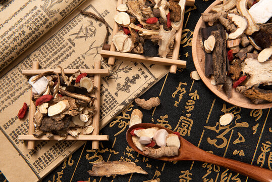 Chinese herbal medicine selection on calligraphy background