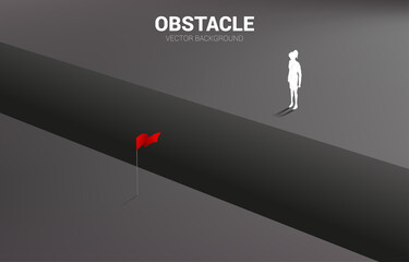silhouette of businesswoman standing at abyss looking to goal. concept of business challenge and obstacle