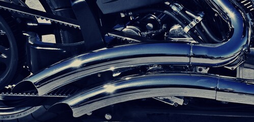 Close up of chrome exhaust pipes on a motorbike