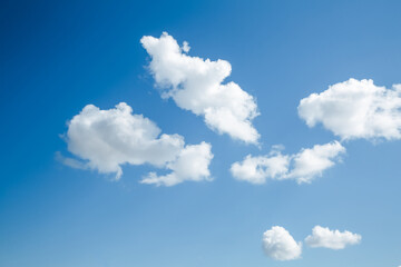 Fototapeta na wymiar White, Fluffy Clouds In Blue Sky. Background From Clouds