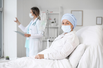 Mature woman undergoing chemical therapy course in clinic