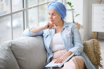 Mature woman after chemotherapy at home