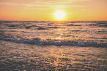 Seascape in the early morning. Sunrise over the sea with beautiful sky