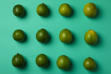 Flat lay with ripe lime on mint background