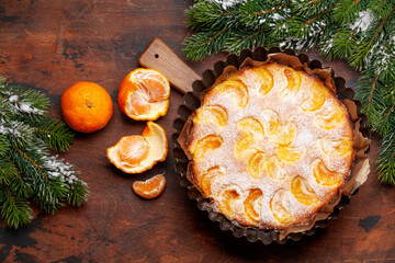 Obraz na płótnie Canvas Citrus dessert holiday cake with tangerines