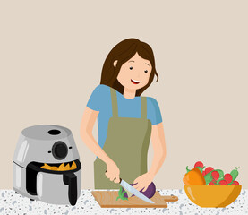 A girl prepares potatoes in the kitchen in an air fryer, cuts a glassplant for grilling. Nearby is a bowl of washed vegetables for a salad.
Write at home.