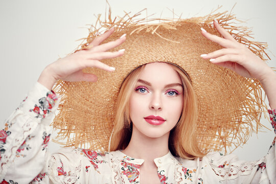 romantic girl in straw hat