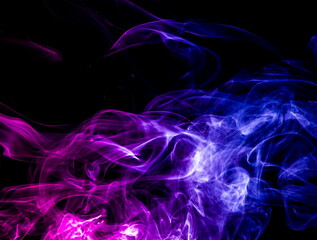 Colored smoke on black background