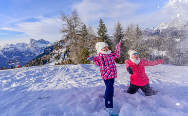  Portrait of beautiful woman with ski and ski suit in winter mountain  © Beenis